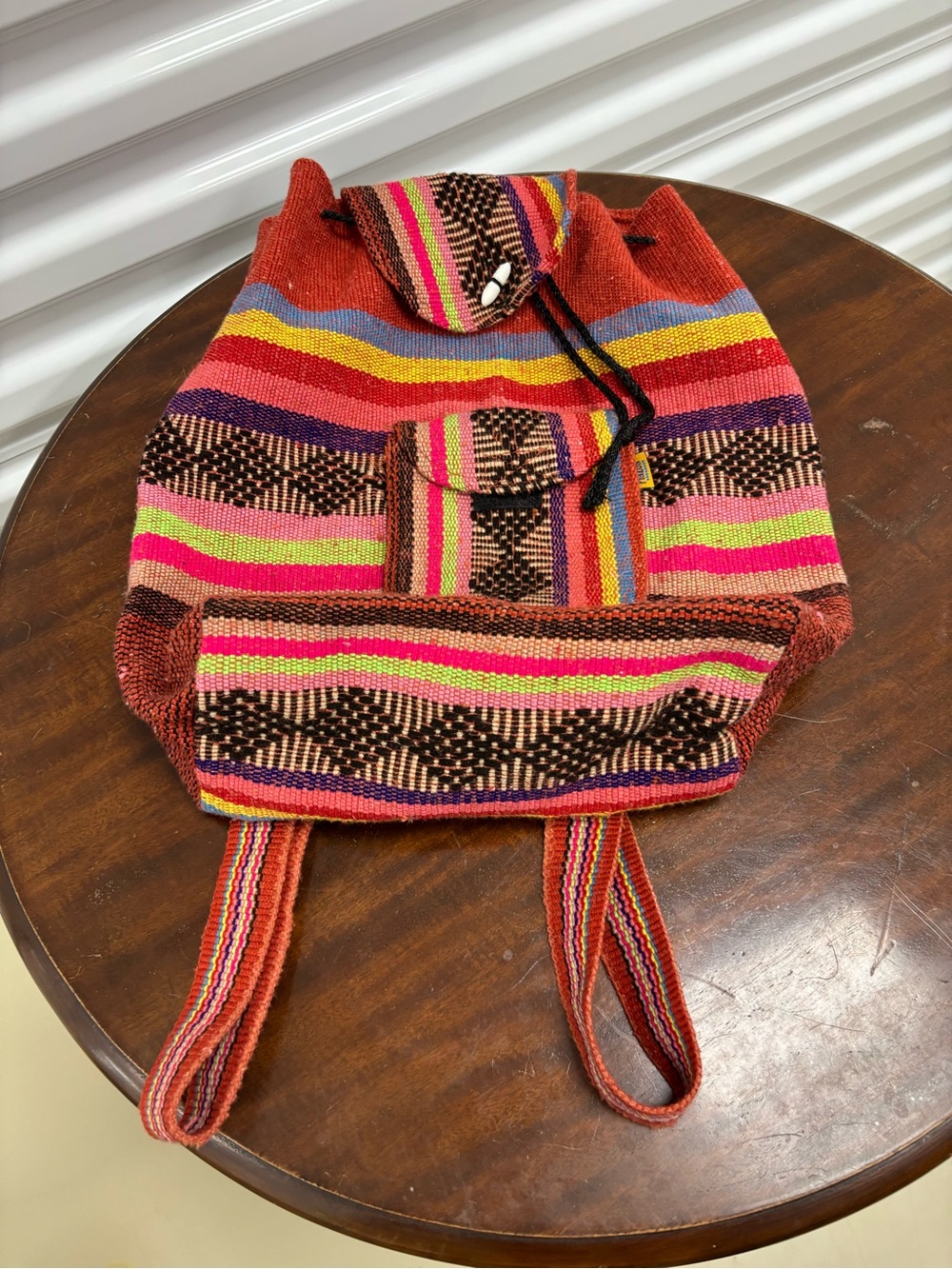 Bright Multicolor Woven Bag with Yellow Brand Tag